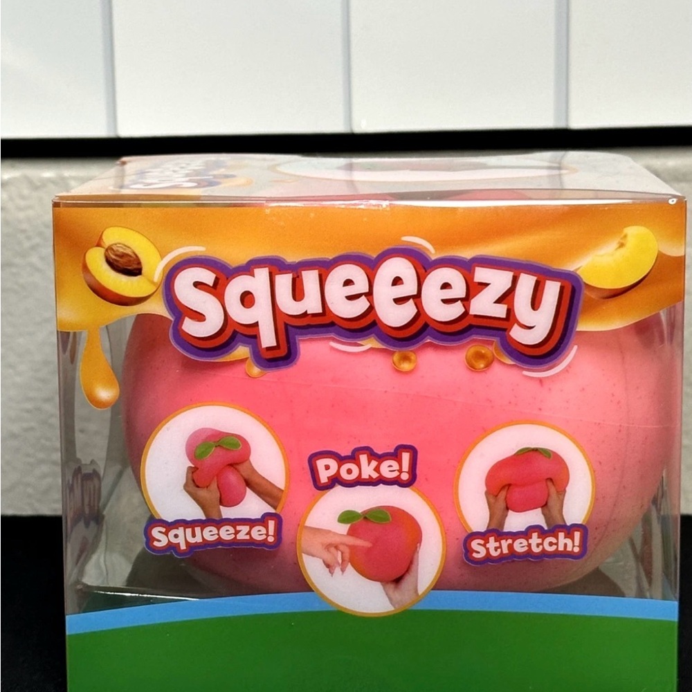 Squeezy Pink Peach Stress Squishy Toy